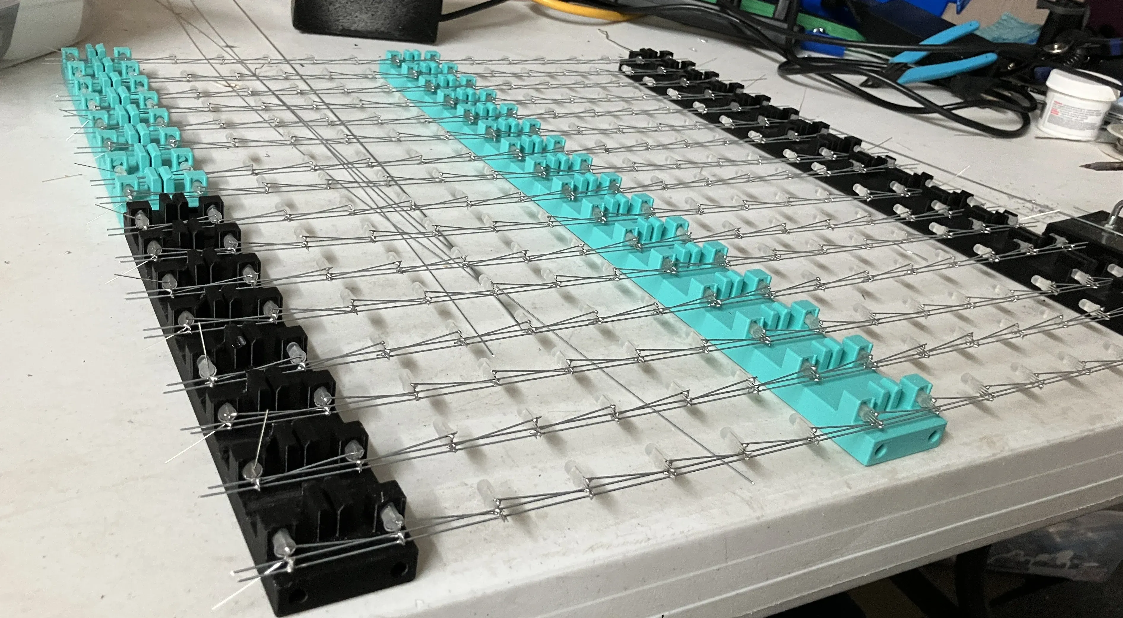 Second set of jigs combines 16 strips into a 16x16x1 sheet.