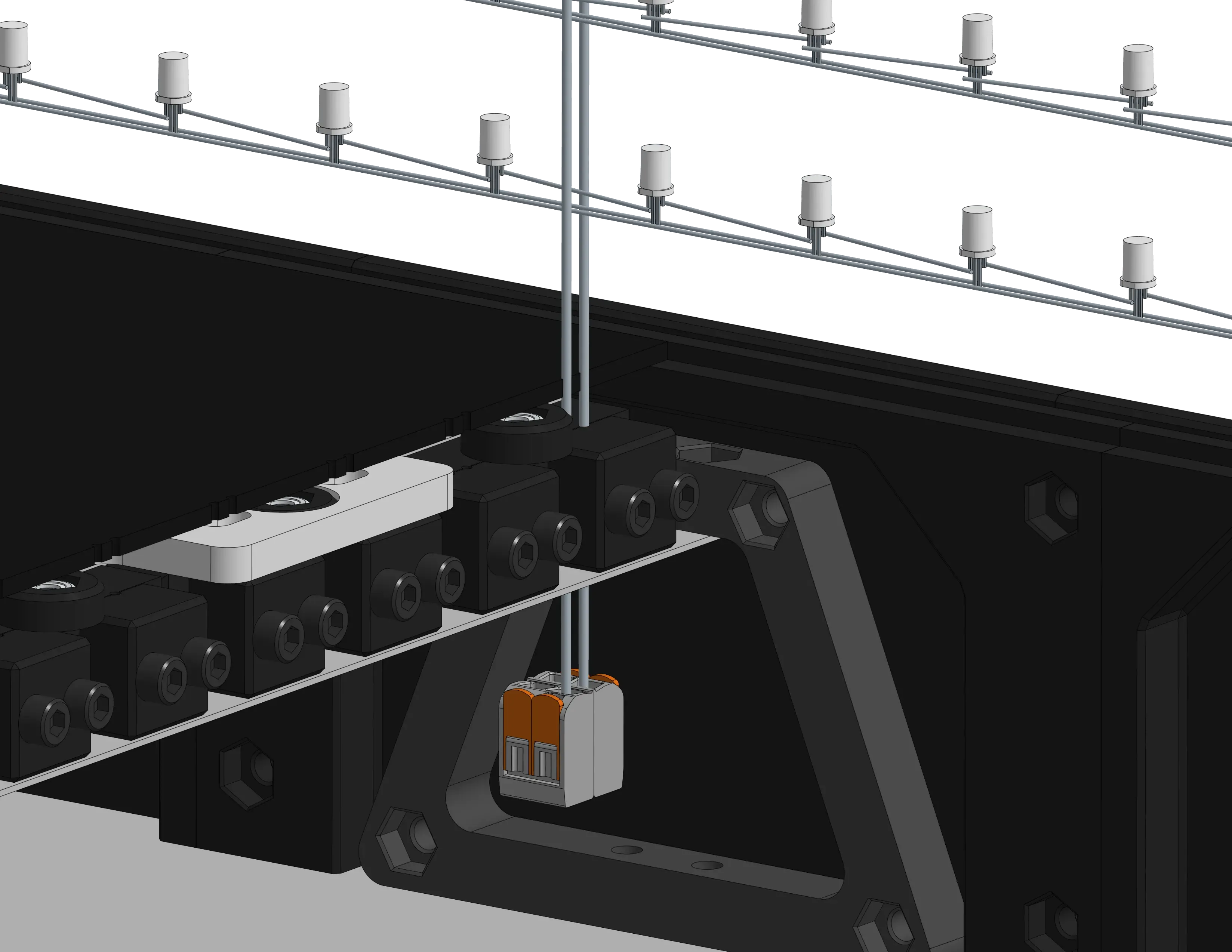 Mounting of a single sheet, through clamps and into Wagos. Shows half of the decorative top panel the wires must fit through.